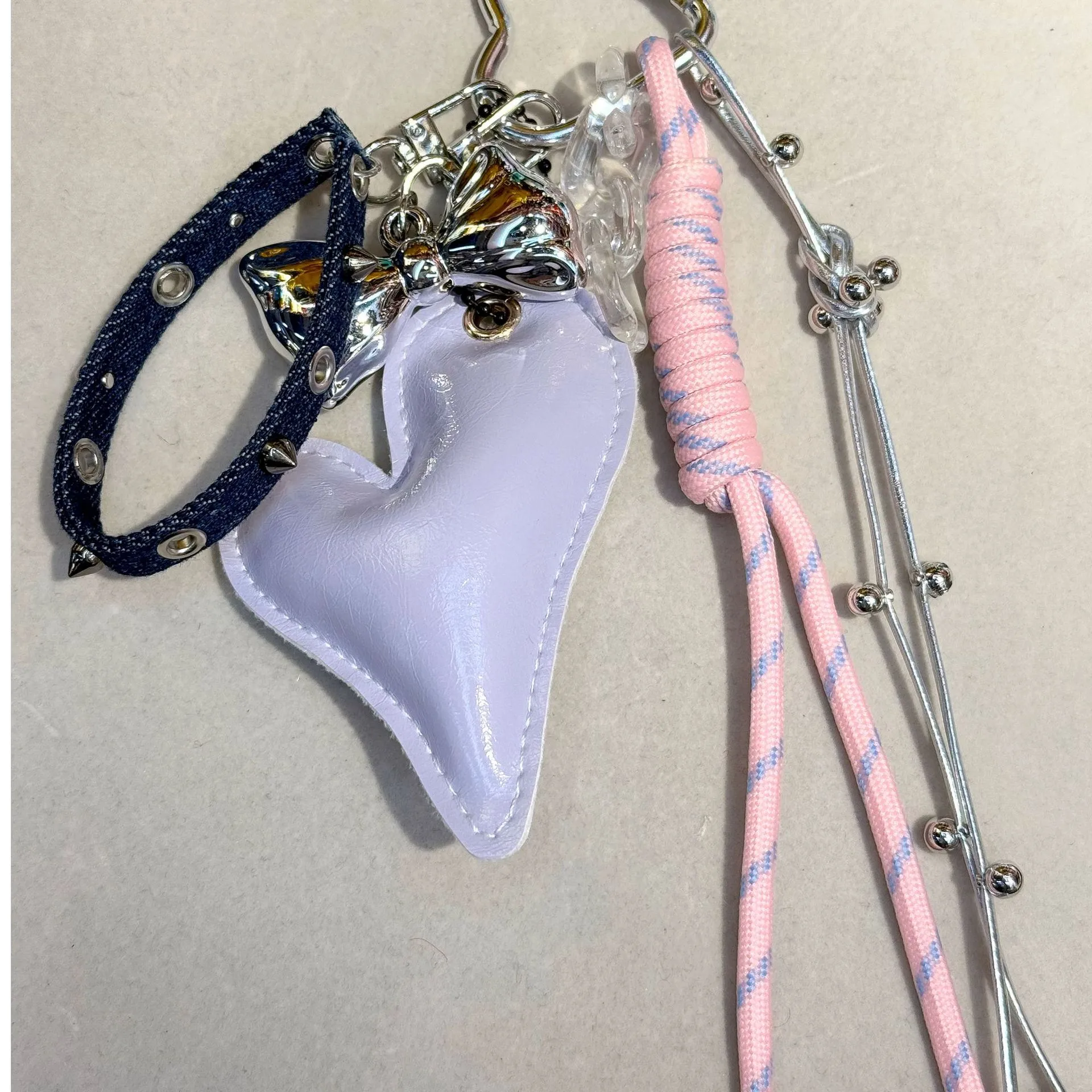 Original Miu Series Classic Love Oblique Pattern Affordable Luxury Style All-Match Peach Heart Bag Hanging High-Grade Leather Temperament Pendant display picture 2