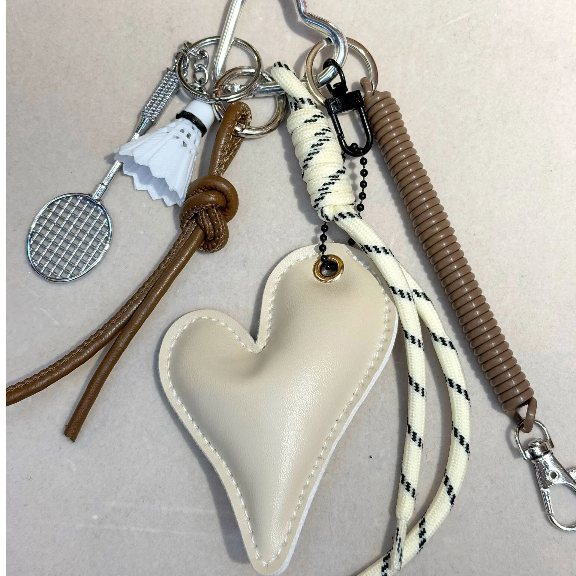 Original Miu Series Classic Love Oblique Pattern Affordable Luxury Style All-Match Peach Heart Bag Hanging High-Grade Leather Temperament Pendant display picture 5