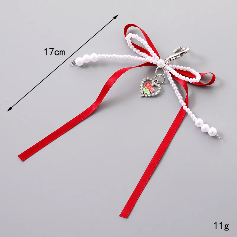 1 Piece Cute Modern Style Classic Style Heart Shape Bow Knot Imitation Pearl Alloy Women's Heart Clasp Closure Bag Pendant Keychain display picture 2