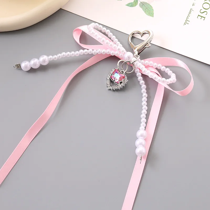 1 Piece Cute Modern Style Classic Style Heart Shape Bow Knot Imitation Pearl Alloy Women's Heart Clasp Closure Bag Pendant Keychain display picture 3