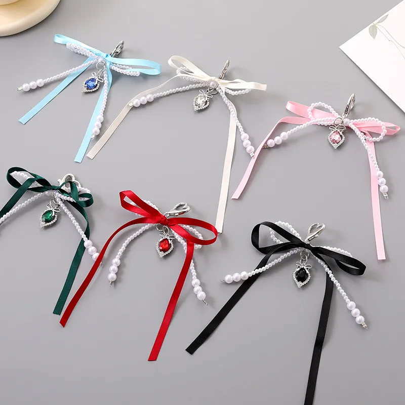1 Piece Cute Modern Style Classic Style Heart Shape Bow Knot Imitation Pearl Alloy Women's Heart Clasp Closure Bag Pendant Keychain display picture 1