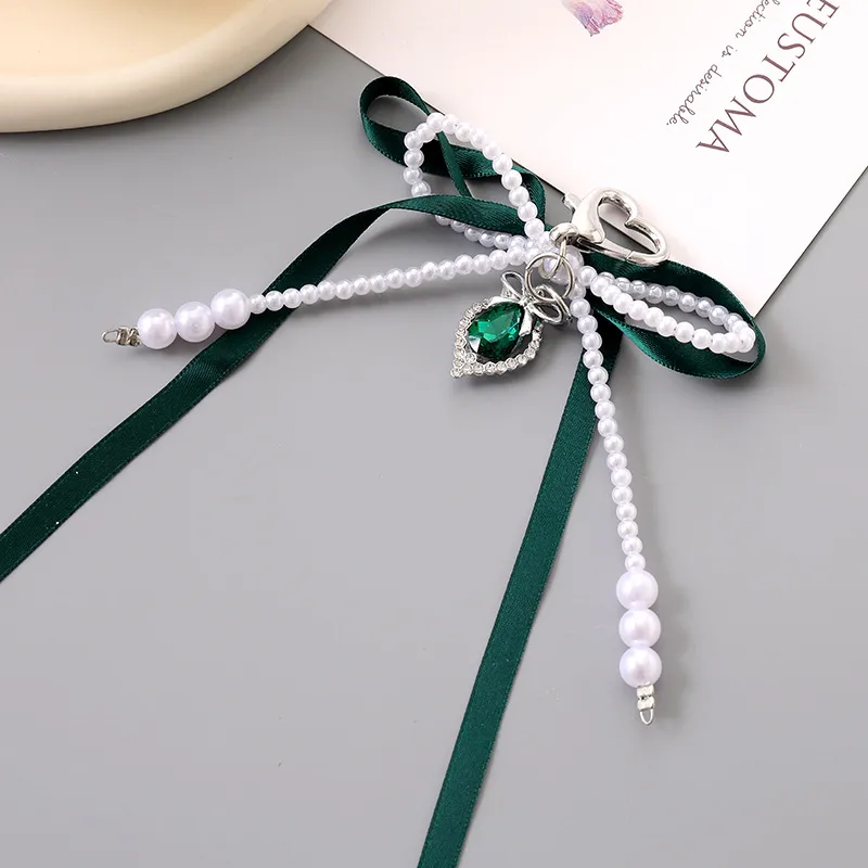 1 Piece Cute Modern Style Classic Style Heart Shape Bow Knot Imitation Pearl Alloy Women's Heart Clasp Closure Bag Pendant Keychain display picture 4