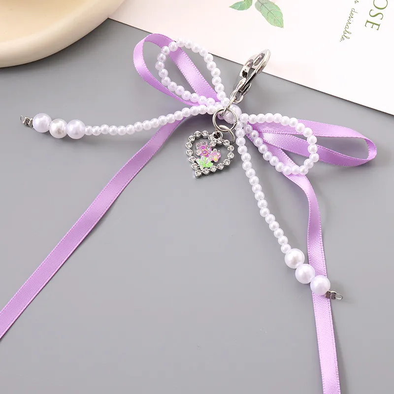 1 Piece Cute Modern Style Classic Style Heart Shape Bow Knot Imitation Pearl Alloy Women's Heart Clasp Closure Bag Pendant Keychain display picture 6
