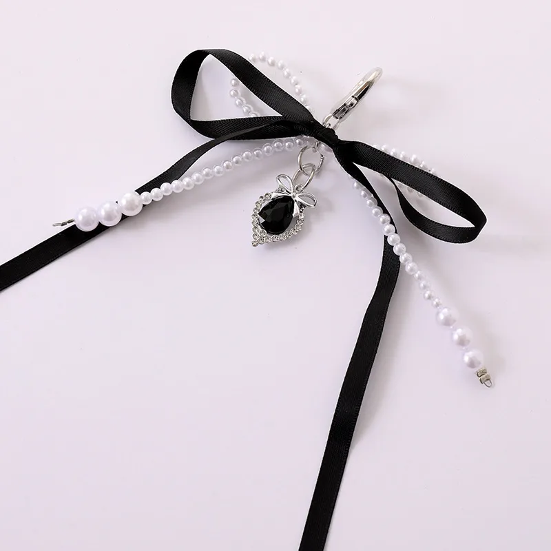 1 Piece Cute Modern Style Classic Style Heart Shape Bow Knot Imitation Pearl Alloy Women's Heart Clasp Closure Bag Pendant Keychain display picture 8