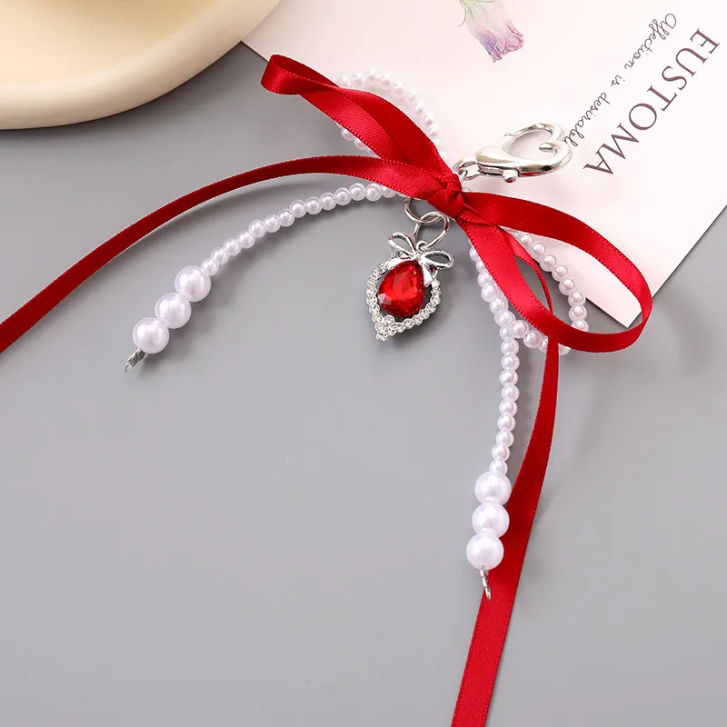 1 Piece Cute Modern Style Classic Style Heart Shape Bow Knot Imitation Pearl Alloy Women's Heart Clasp Closure Bag Pendant Keychain display picture 5