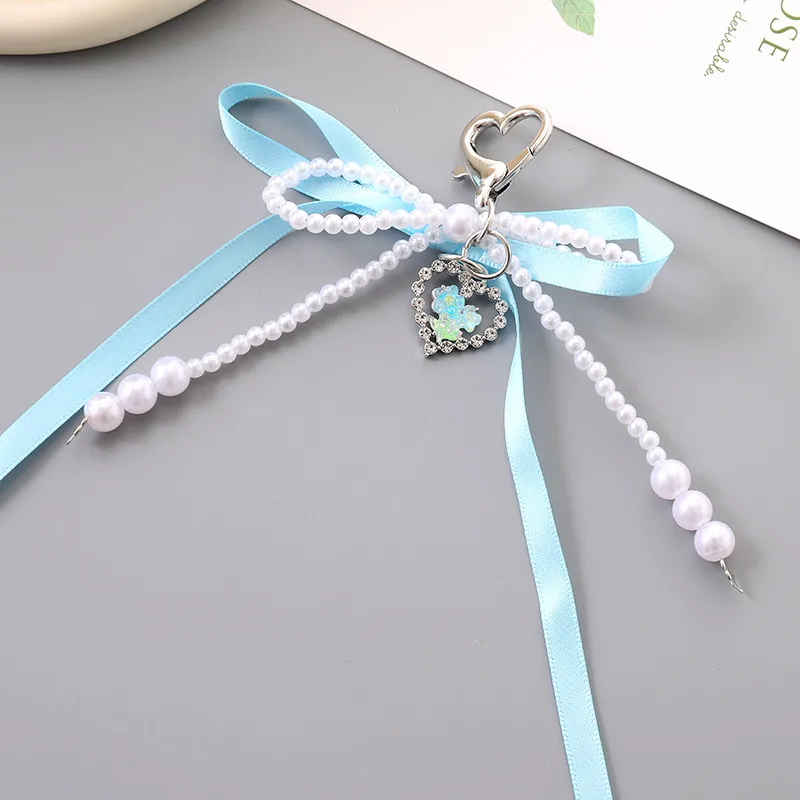 1 Piece Cute Modern Style Classic Style Heart Shape Bow Knot Imitation Pearl Alloy Women's Heart Clasp Closure Bag Pendant Keychain display picture 7
