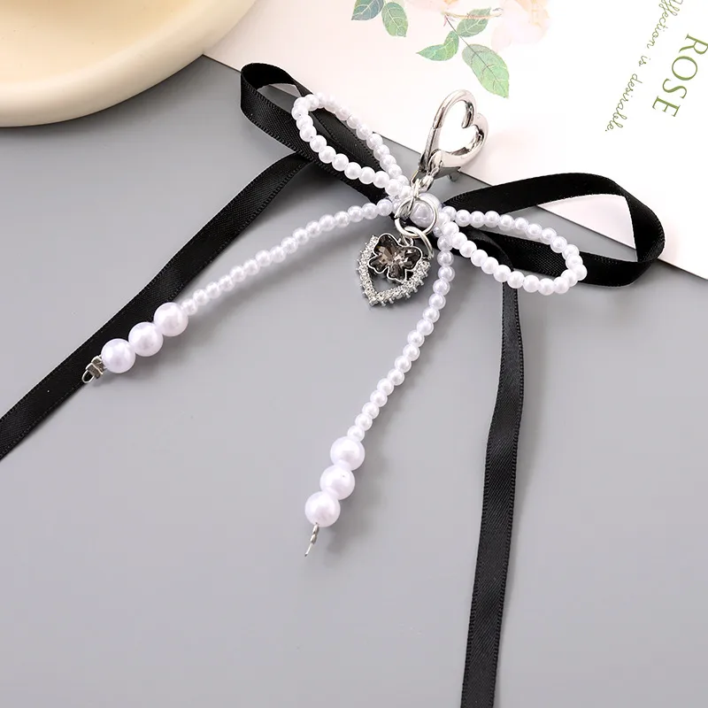 1 Piece Cute Modern Style Classic Style Heart Shape Bow Knot Imitation Pearl Alloy Women's Heart Clasp Closure Bag Pendant Keychain display picture 8