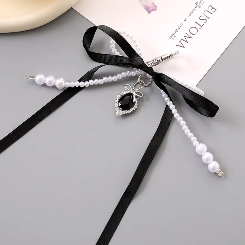 1 Piece Cute Modern Style Classic Style Heart Shape Bow Knot Imitation Pearl Alloy Women's Heart Clasp Closure Bag Pendant Keychain display picture 7