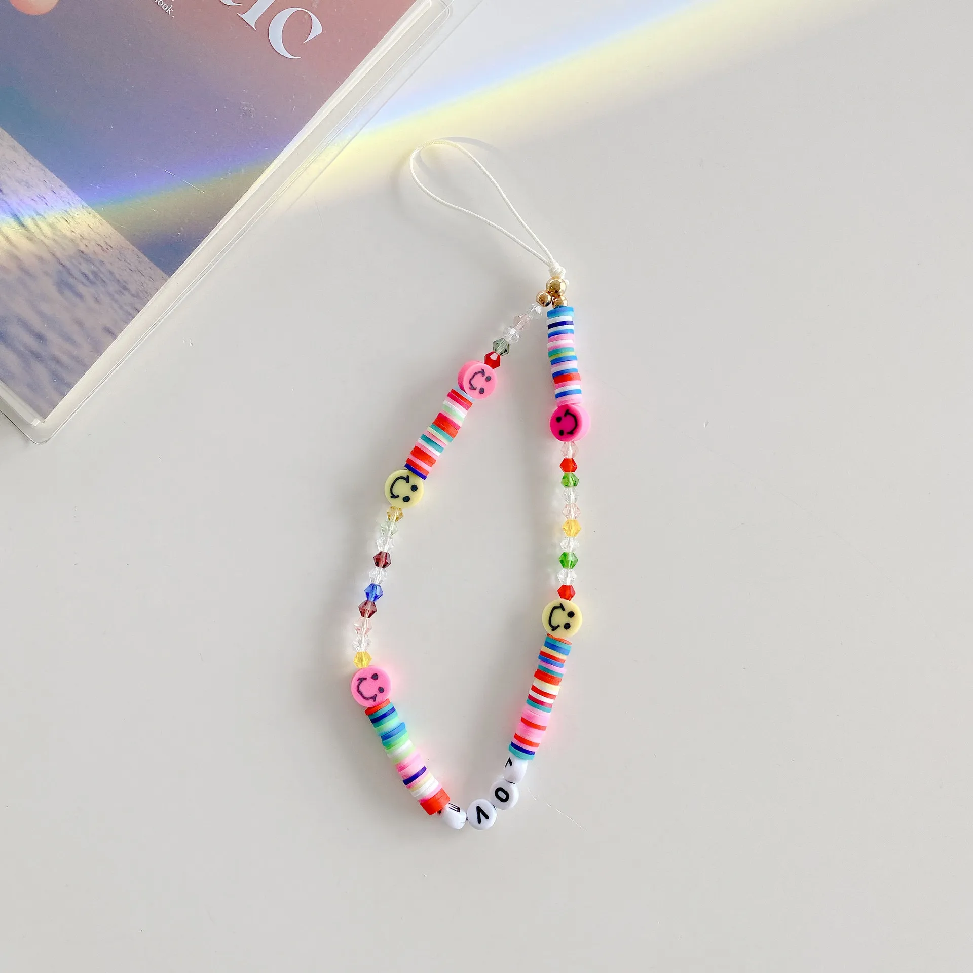New Blue Flower Mobile Phone Charm Short Pendant Ins Lanyard Female Smiling Face Bracelet Love PVC Plastic Buckle display picture 6