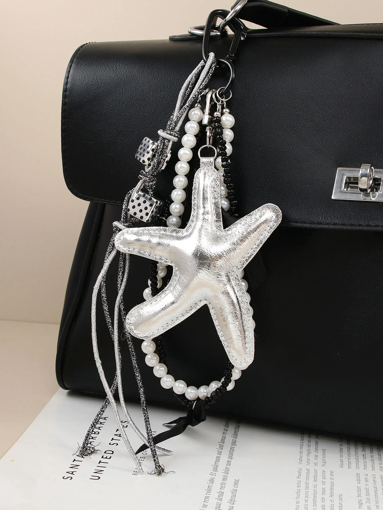New Sweet Exquisite Glitter Leather Silver Star Keychain Miu Series Pearl Chain Bag Pendant Personalized Design PU Material display picture 2