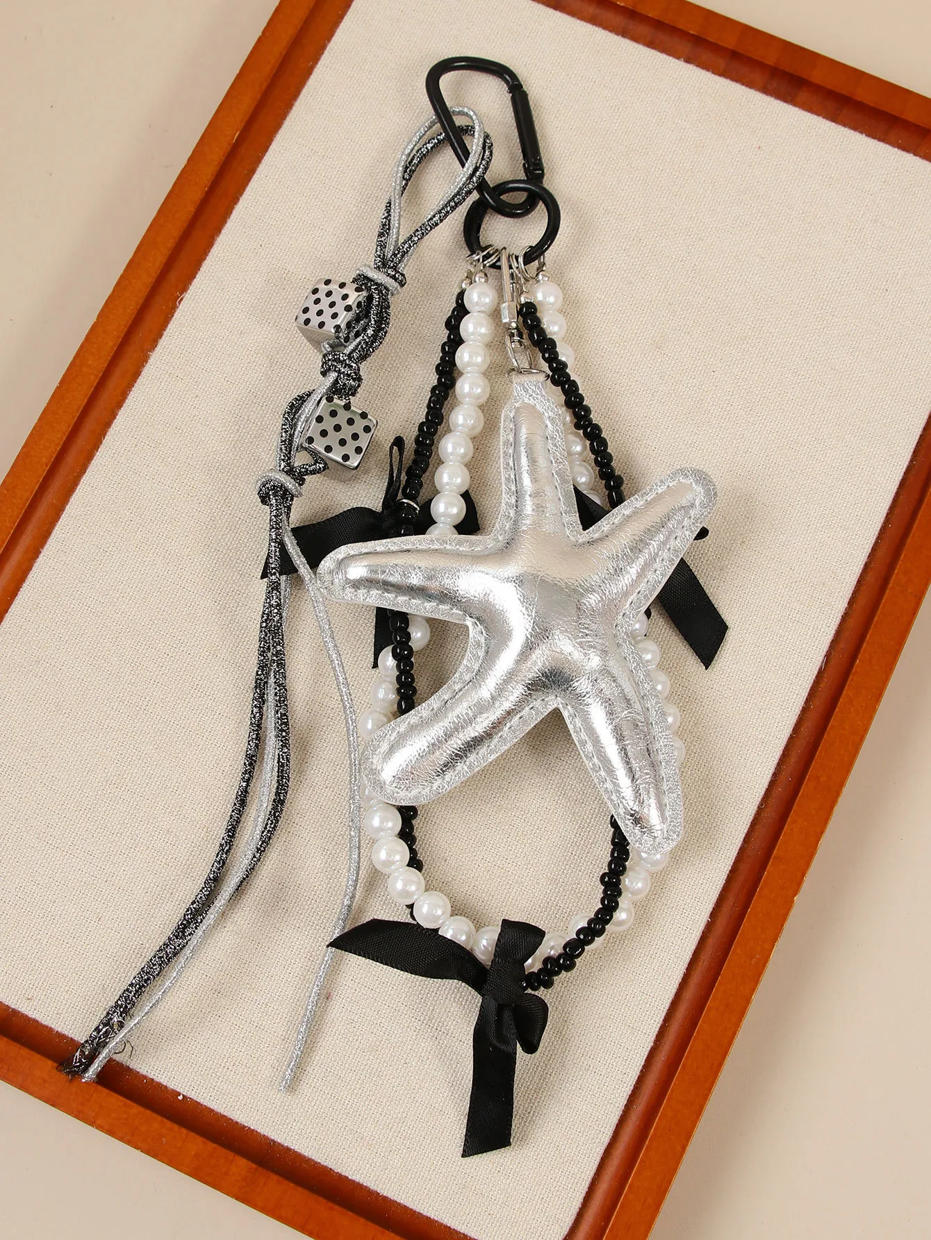 New Sweet Exquisite Glitter Leather Silver Star Keychain Miu Series Pearl Chain Bag Pendant Personalized Design PU Material display picture 5
