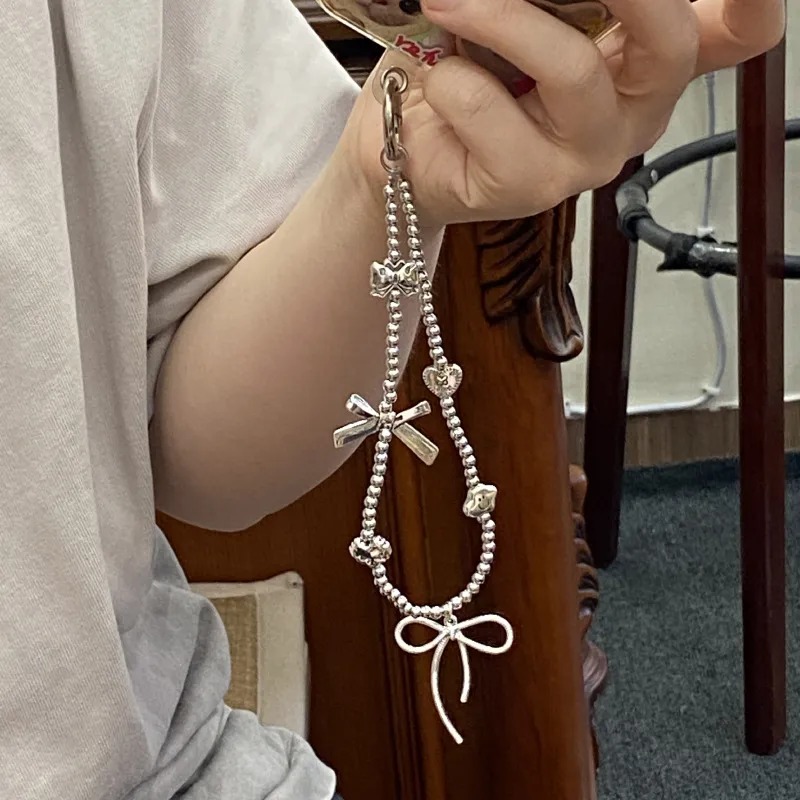 Silver Butterfly Knot Beaded Phone Chain New Ins Girl Ccd Lanyard Bag Pendant Cool Original Design Minimalist Style display picture 8