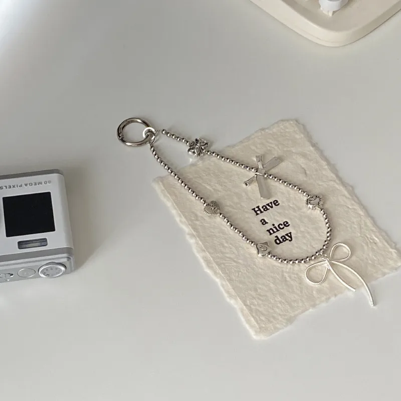Silver Butterfly Knot Beaded Phone Chain New Ins Girl Ccd Lanyard Bag Pendant Cool Original Design Minimalist Style display picture 3