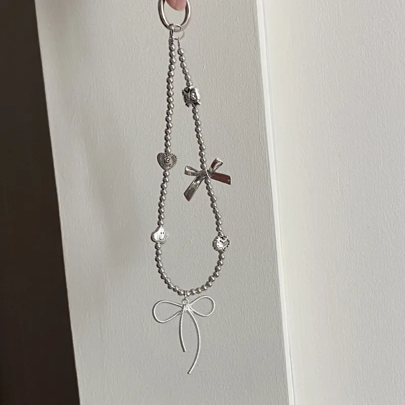 Silver Butterfly Knot Beaded Phone Chain New Ins Girl Ccd Lanyard Bag Pendant Cool Original Design Minimalist Style display picture 4