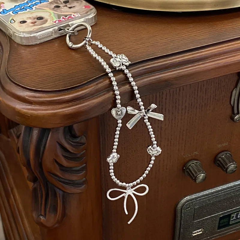 Silver Butterfly Knot Beaded Phone Chain New Ins Girl Ccd Lanyard Bag Pendant Cool Original Design Minimalist Style display picture 14