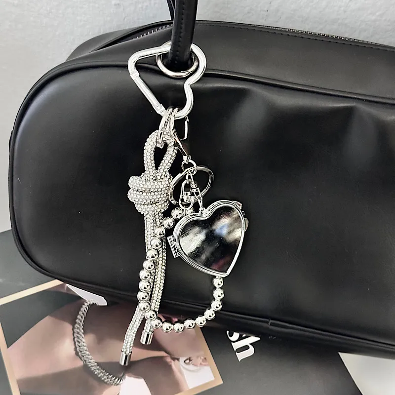 Silver Heart-Shaped Bag Accessories Simple Style Braided Rope Keychain Metal Texture Acrylic Material Super Lightweight display picture 3