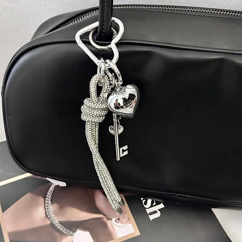Silver Heart-Shaped Bag Accessories Simple Style Braided Rope Keychain Metal Texture Acrylic Material Super Lightweight display picture 2