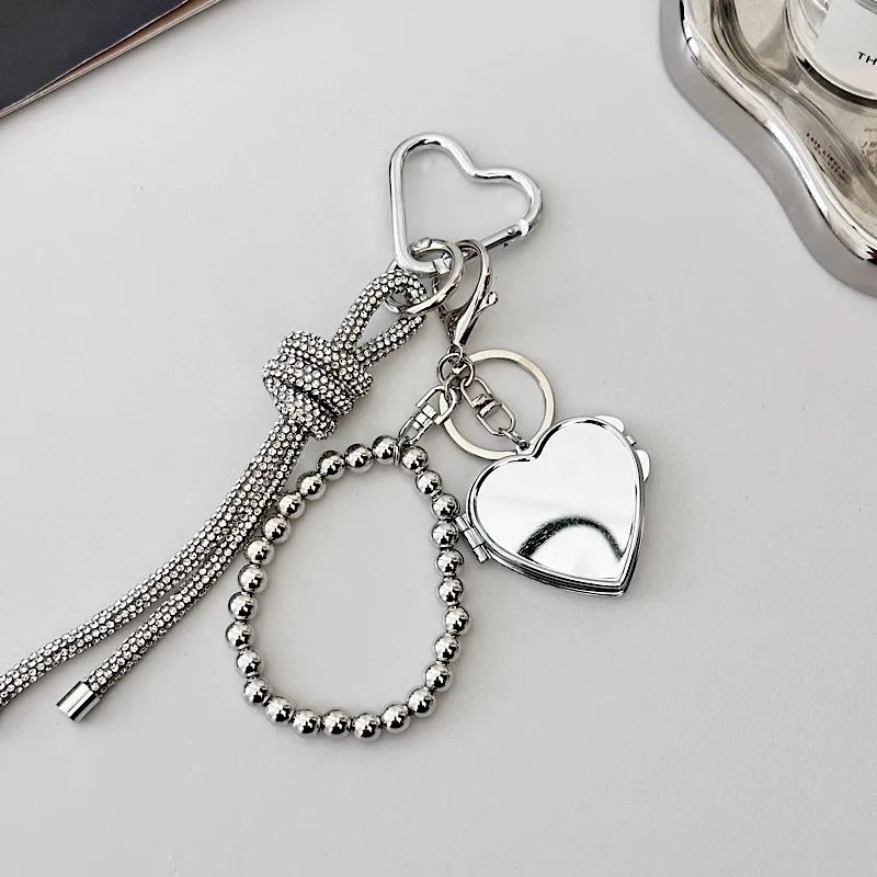 Silver Heart-Shaped Bag Accessories Simple Style Braided Rope Keychain Metal Texture Acrylic Material Super Lightweight display picture 4