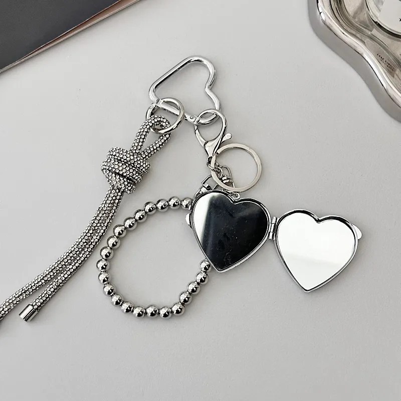 Silver Heart-Shaped Bag Accessories Simple Style Braided Rope Keychain Metal Texture Acrylic Material Super Lightweight display picture 6