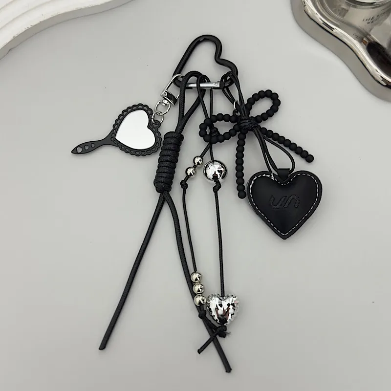 Creative Black Rope Silver Heart-Shaped Black Bead Bow Leather Pendant Suitable For Mobile Phone Bag Keychain Accessories display picture 5