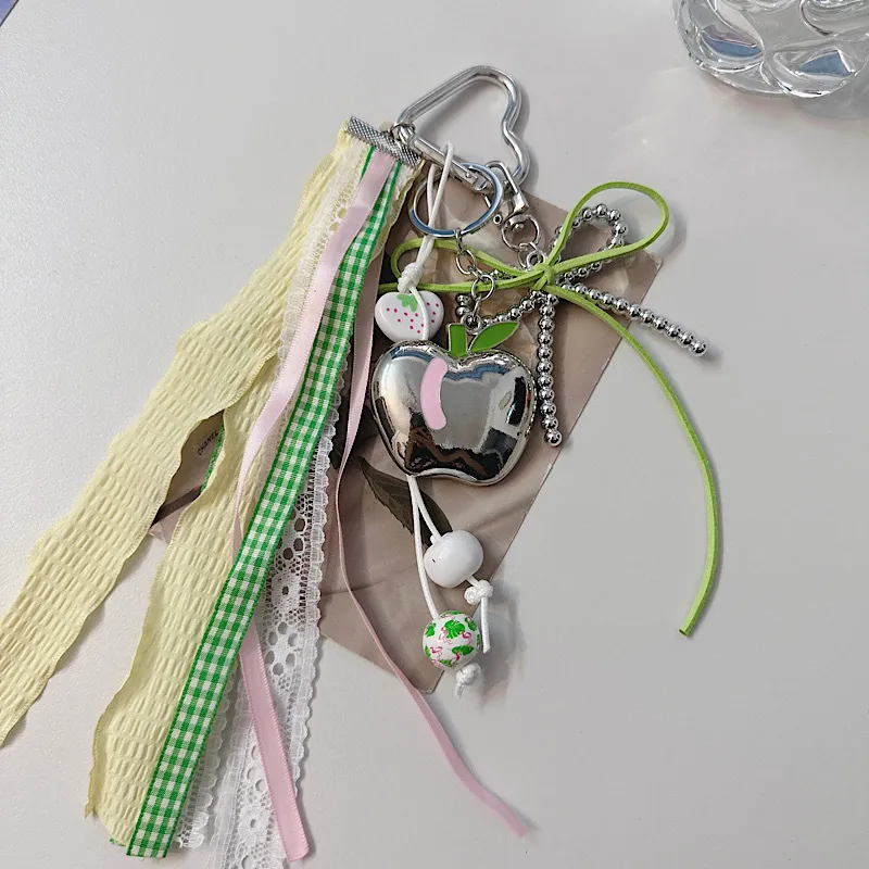 Creative Apple Bow Lace Keychain Pearl Earphone Sleeves Lanyard Backpack Accessories New Acrylic Sweet Pattern display picture 2
