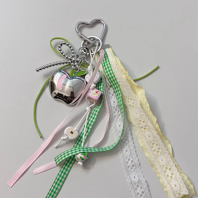 Creative Apple Bow Lace Keychain Pearl Earphone Sleeves Lanyard Backpack Accessories New Acrylic Sweet Pattern display picture 5