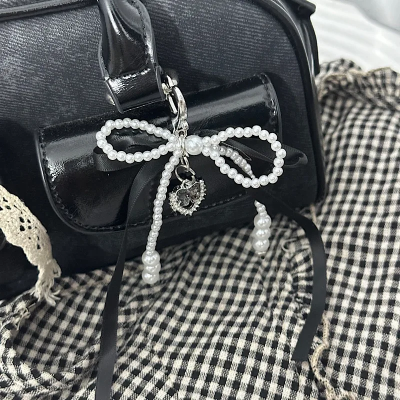 Elegant Silk Ribbon Pearl Bow Pendant Ins Style Heart-Shaped Keychain AirPods Accessory Bag Decoration display picture 2
