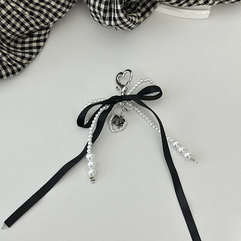 Elegant Silk Ribbon Pearl Bow Pendant Ins Style Heart-Shaped Keychain AirPods Accessory Bag Decoration display picture 7