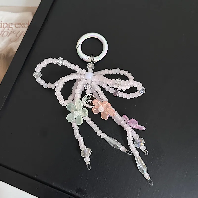 Sweet Pearl Pairs Bow Mobile Phone Charm Handmade Beaded Keychain Bag Accessories New Jewelry Accessories display picture 3