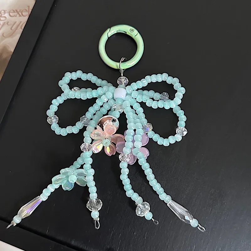 Sweet Pearl Pairs Bow Mobile Phone Charm Handmade Beaded Keychain Bag Accessories New Jewelry Accessories display picture 4