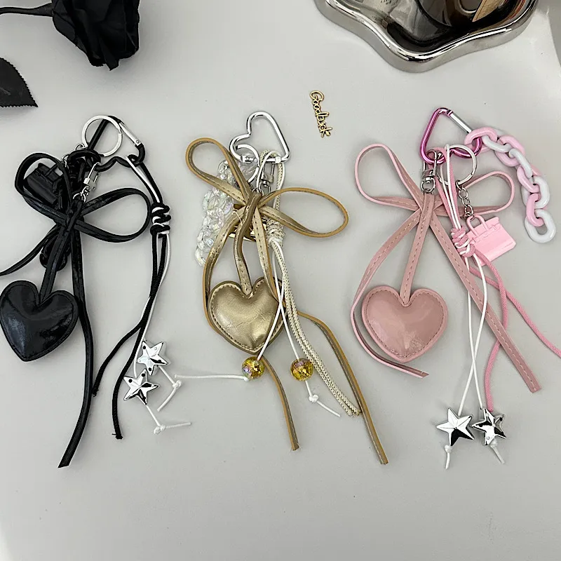 Mini Gold Leather Heart-Shaped Keychain Bag Accessories Women's Simple Style PVC Printed Dark Series Fashion Accessories display picture 1