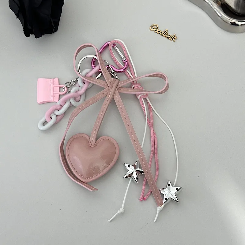 Mini Gold Leather Heart-Shaped Keychain Bag Accessories Women's Simple Style PVC Printed Dark Series Fashion Accessories display picture 2