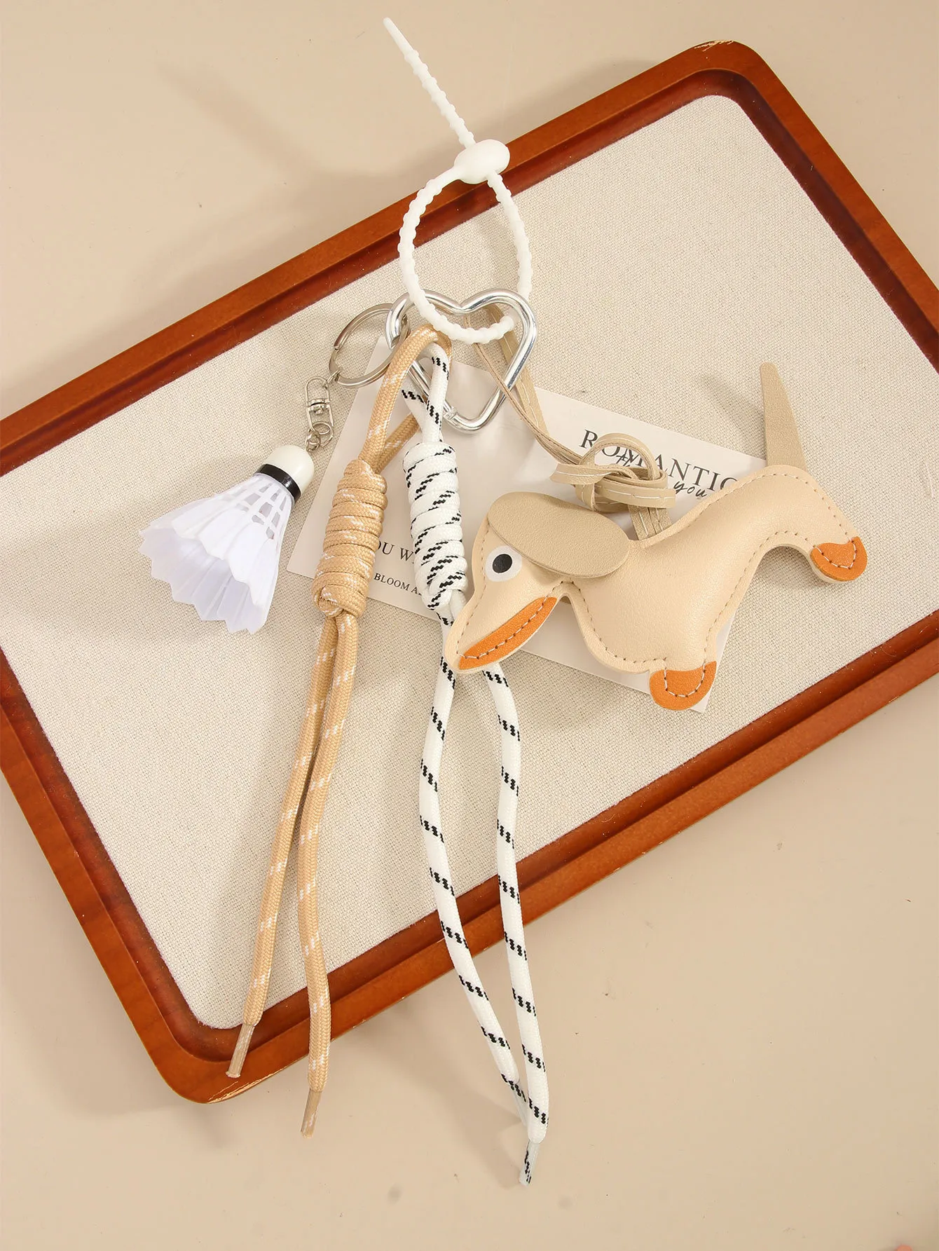 Cute Leather Sausage Dog Keychain Package Pendant Handmade Braided Rope Miu Style Original Design Pu Material Animal Pattern Ornaments display picture 12