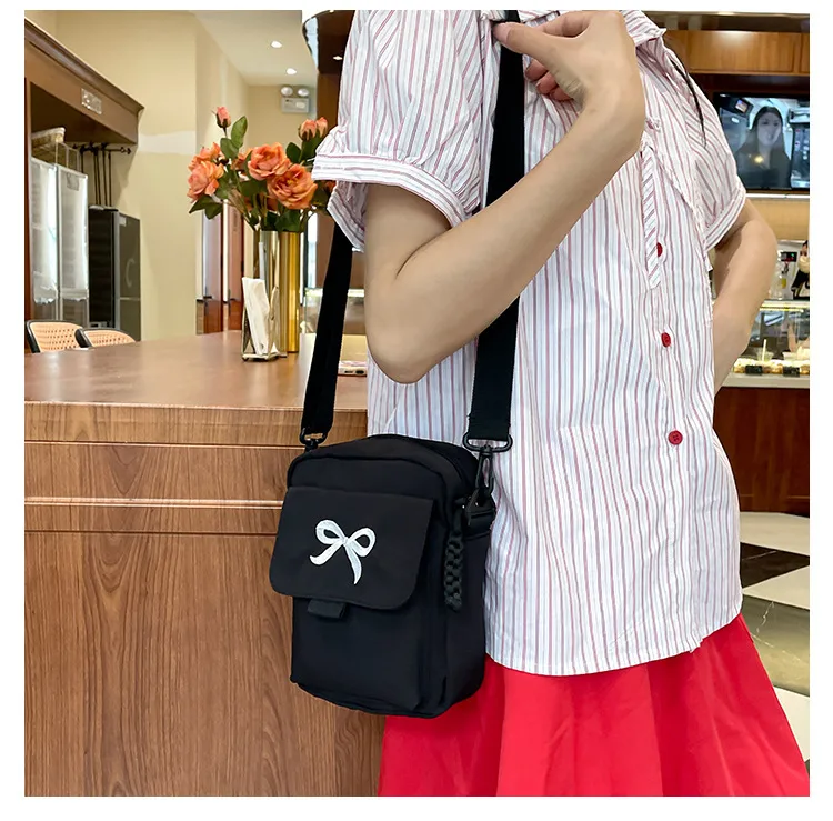 Cute Bow Tie Student Commuter Single-shoulder Bag, Soft And Girly Forest-style Small Crossbody Bag display picture 4