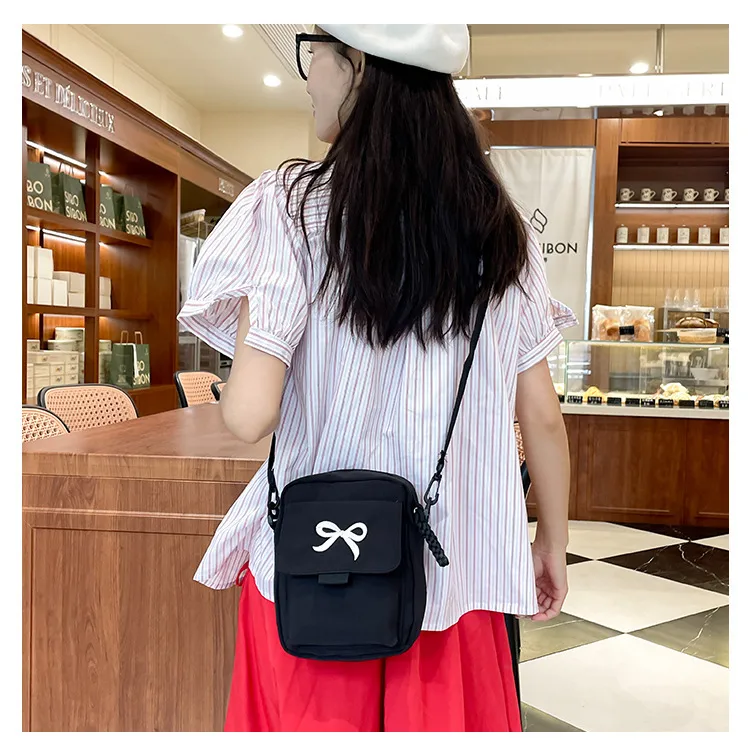 Cute Bow Tie Student Commuter Single-shoulder Bag, Soft And Girly Forest-style Small Crossbody Bag display picture 6