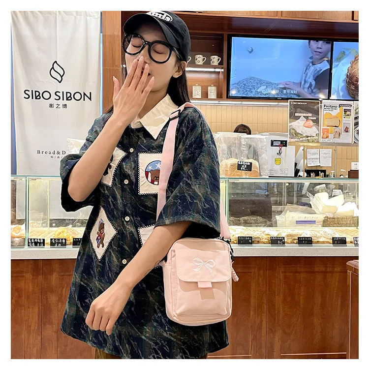 Cute Bow Tie Student Commuter Single-shoulder Bag, Soft And Girly Forest-style Small Crossbody Bag display picture 10