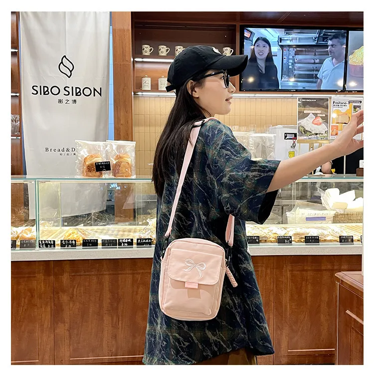 Cute Bow Tie Student Commuter Single-shoulder Bag, Soft And Girly Forest-style Small Crossbody Bag display picture 11
