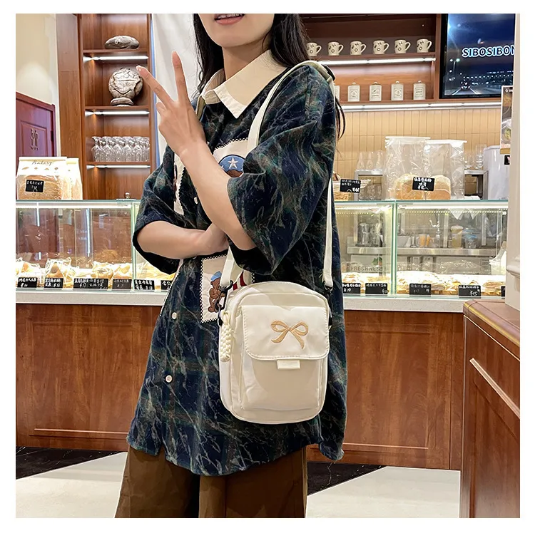 Cute Bow Tie Student Commuter Single-shoulder Bag, Soft And Girly Forest-style Small Crossbody Bag display picture 13