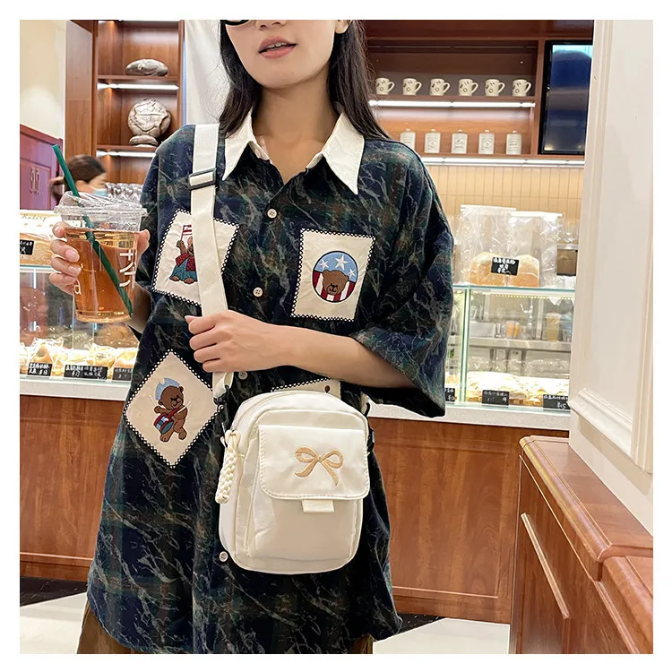 Cute Bow Tie Student Commuter Single-shoulder Bag, Soft And Girly Forest-style Small Crossbody Bag display picture 15