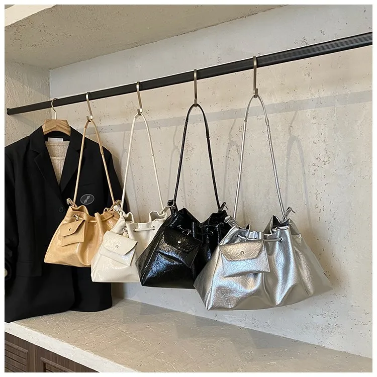 Women's Pu Leather Solid Color Streetwear Dumpling Shape String Shoulder Bag Tote Bag display picture 5