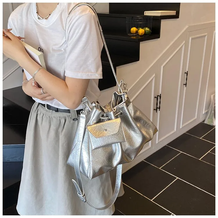 Women's Pu Leather Solid Color Streetwear Dumpling Shape String Shoulder Bag Tote Bag display picture 10