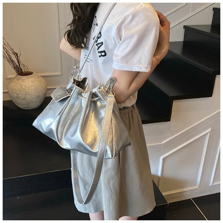 Women's Pu Leather Solid Color Streetwear Dumpling Shape String Shoulder Bag Tote Bag display picture 1