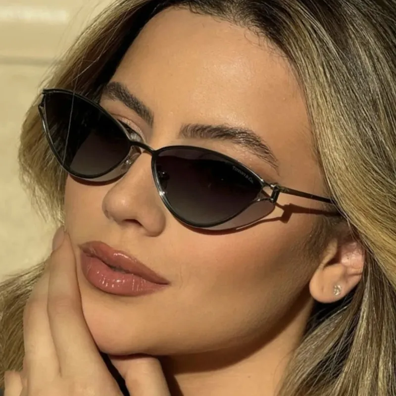 Style Triangle Cat Eye Sunglasses Hollow Personality Metal Sunglasses Street Trend Style Women's Sunglasses display picture 3