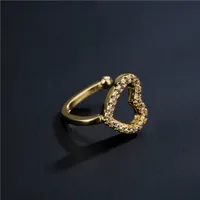 New Copper Micro-inlaid Zircon Hollow Heart Ear Clip main image 2