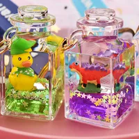 Cute Quicksand Little Yellow Duck Dinosaur Perfume Bottle Acrylic Keychain Wholesale Nihaowholesale main image 1