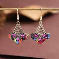 Retro Hollow Geometric Contrast Color Inlaid Rhinestone Fabric Owl Earrings main image 1