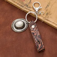Simple Style Cactus Leaf Dreamcatcher Pu Leather Alloy Turquoise Bag Pendant Keychain main image 5