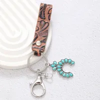 Simple Style Cactus Leaf Dreamcatcher Pu Leather Alloy Turquoise Bag Pendant Keychain main image 2