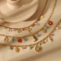 Wholesale Jewelry Basic Bohemian Elephant Flower Boots 304 Stainless Steel Artificial Pearls Natural Stone 18K Gold Plated Epoxy Pendant Necklace main image 1