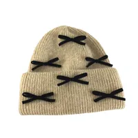 Women's Cute Classic Style Solid Color Bow Knot Eaveless Wool Cap main image 5